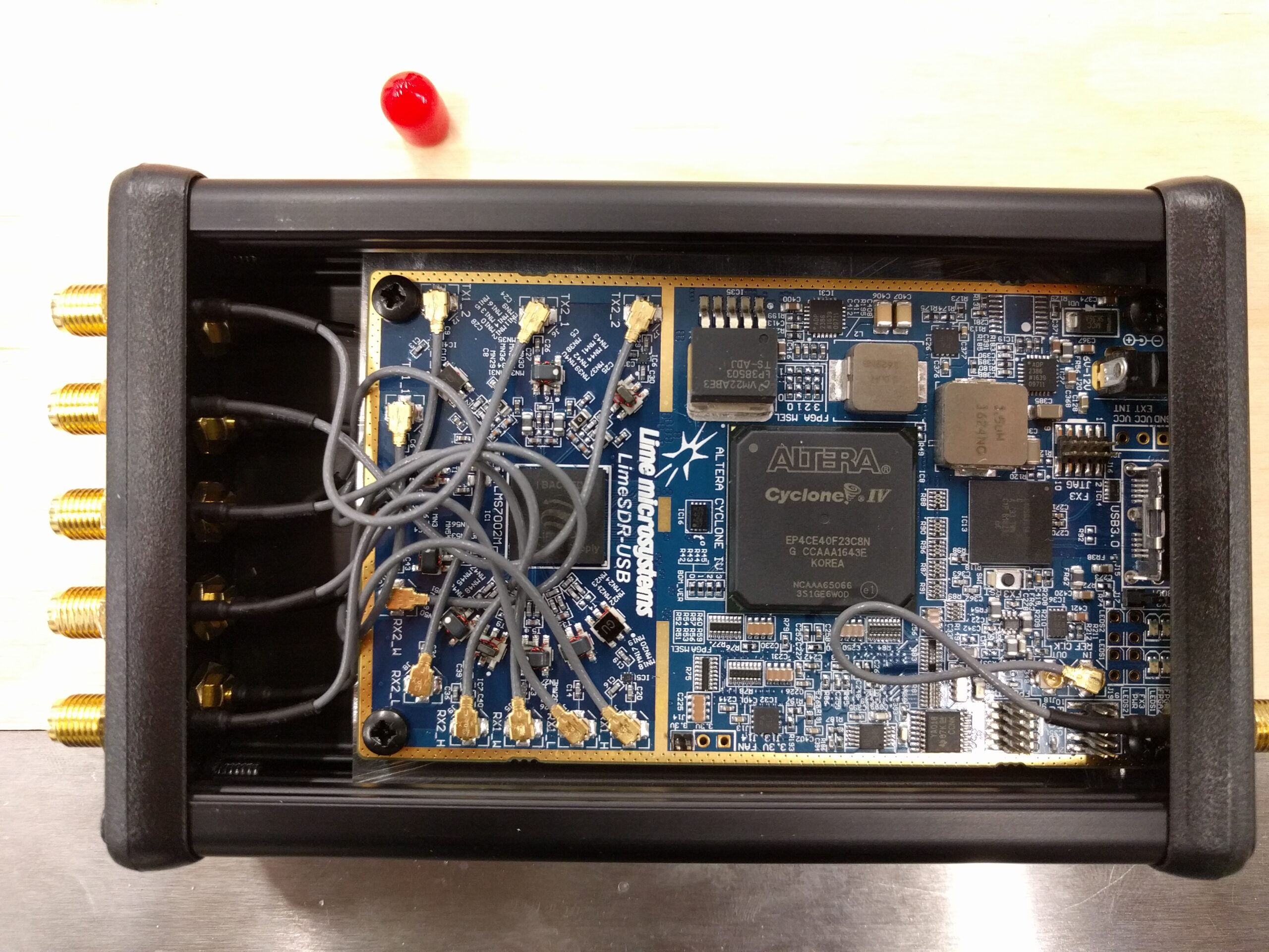 3D model of a custom PCB enclosure with highlighted mounting features