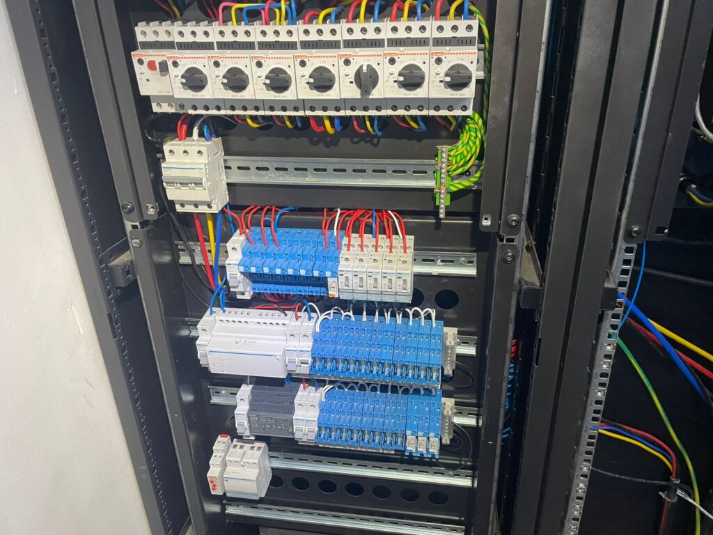 Server rack with DIN rail adapter installed